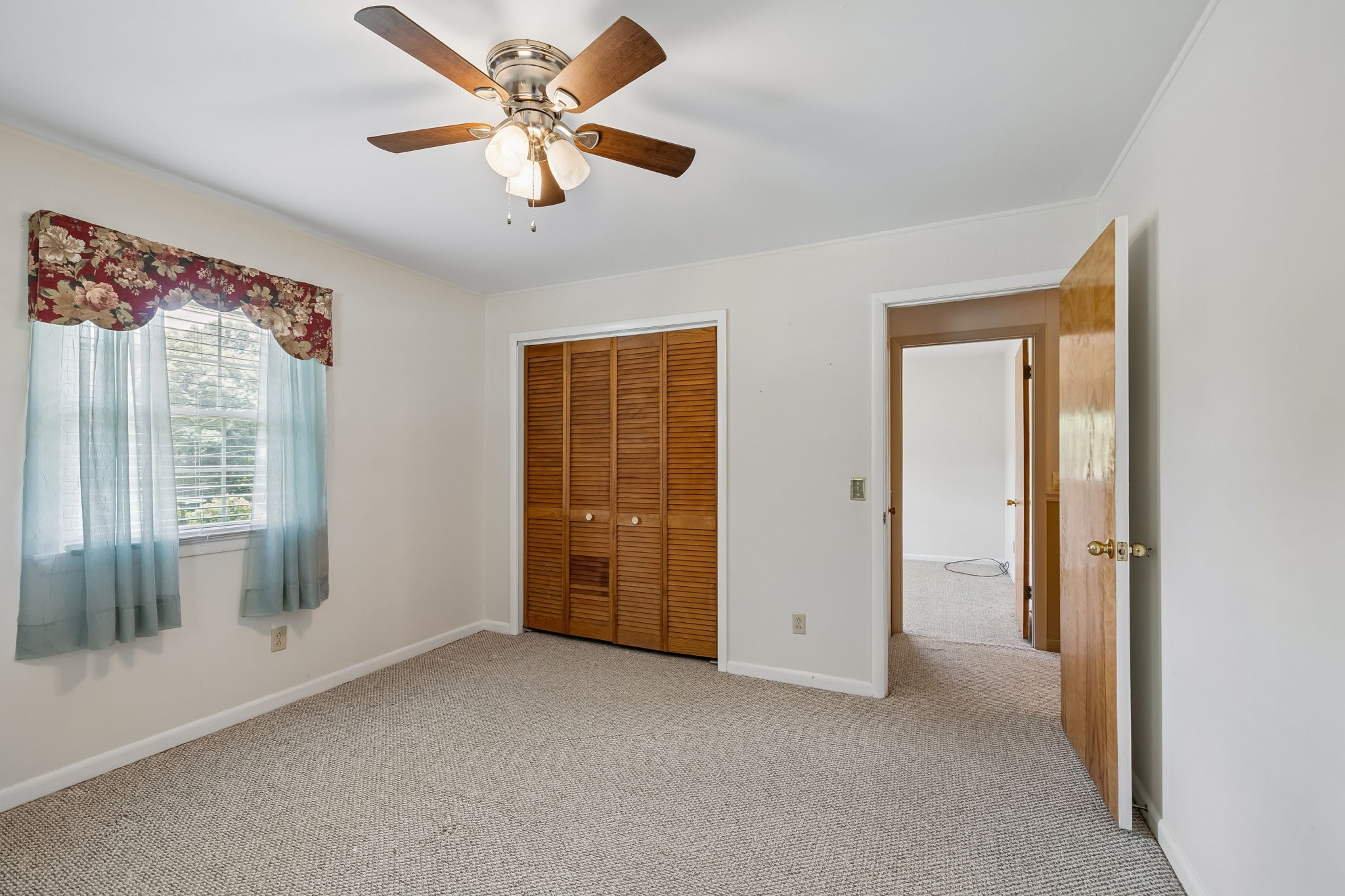 708 Hickory Street Centerville, TN 37033 - Photo 29 of 57 a view of an empty room with a window