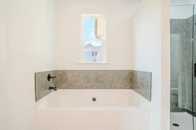 a bathroom with a bathtub