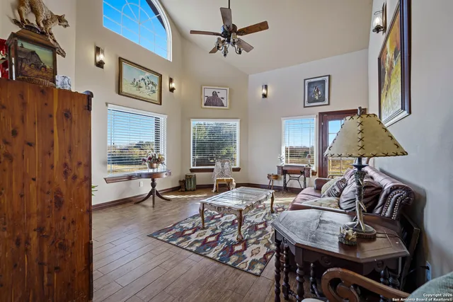 a living room with furniture and a window