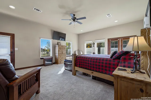 a bed room with a bed and a window