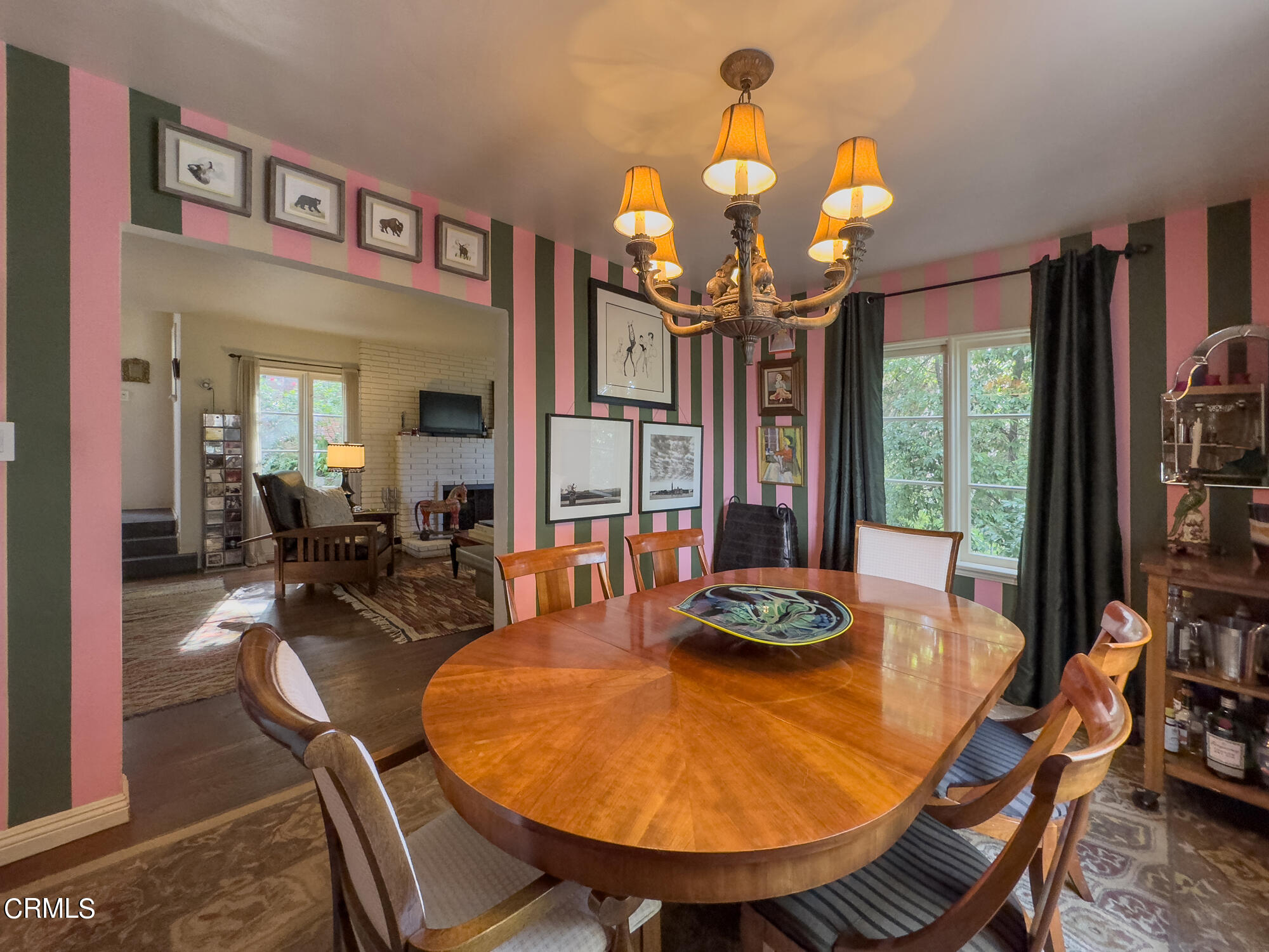 735 Prospect Drive Glendale, CA 91205 - Photo 11 of 49 a view of a dining room with furniture wooden floor and chandelier