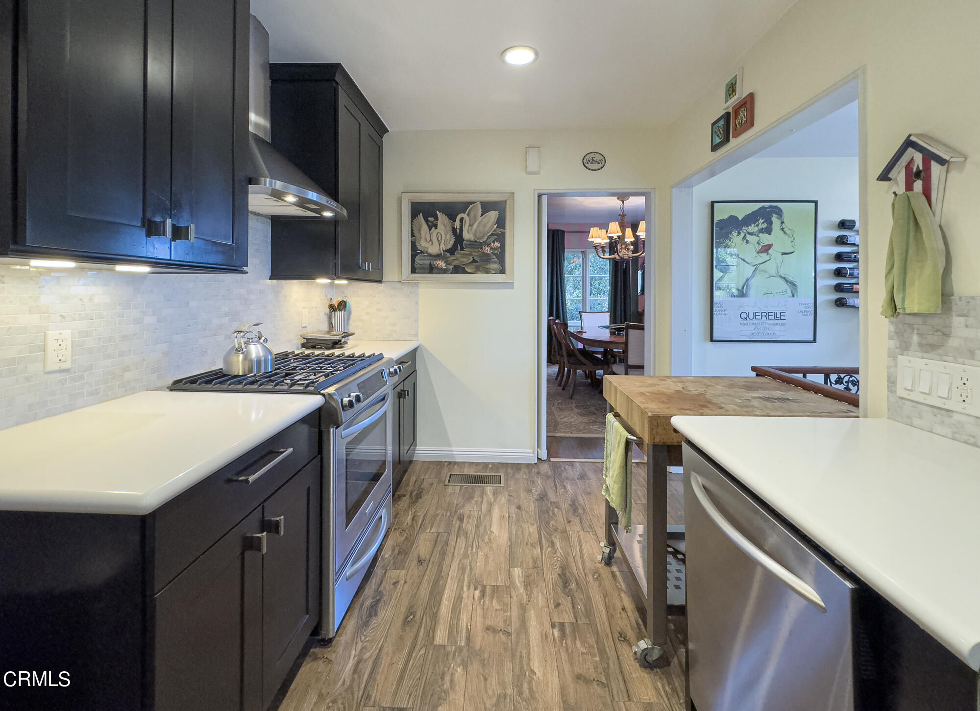 735 Prospect Drive Glendale, CA 91205 - Photo 13 of 49 a kitchen with a sink stove and cabinets
