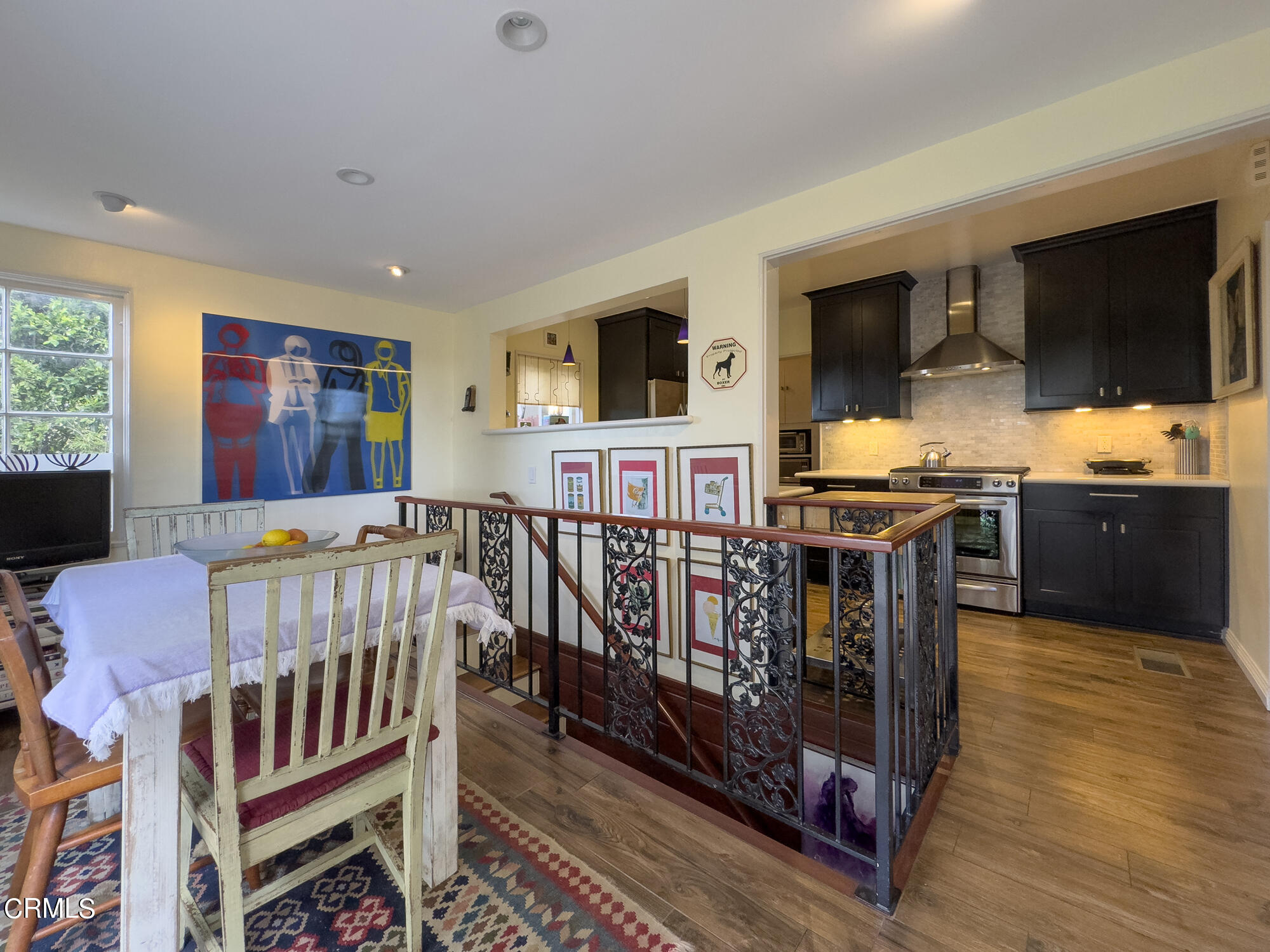 735 Prospect Drive Glendale, CA 91205 - Photo 15 of 49 a living room with furniture and a flat screen tv