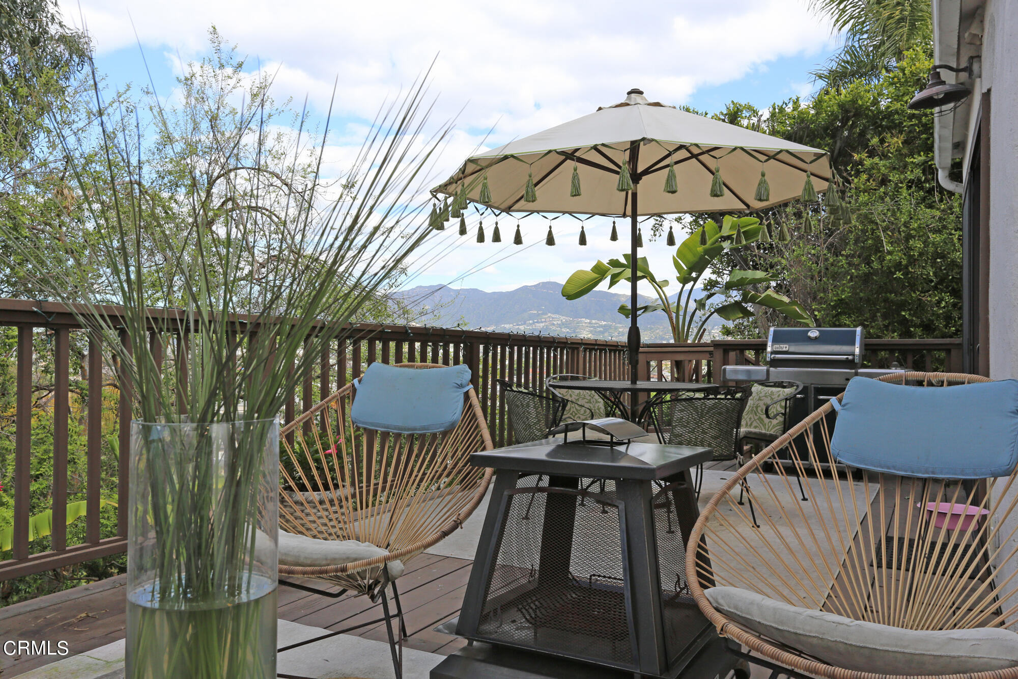 735 Prospect Drive Glendale, CA 91205 - Photo 20 of 49 a view of a balcony with furniture and umbrella