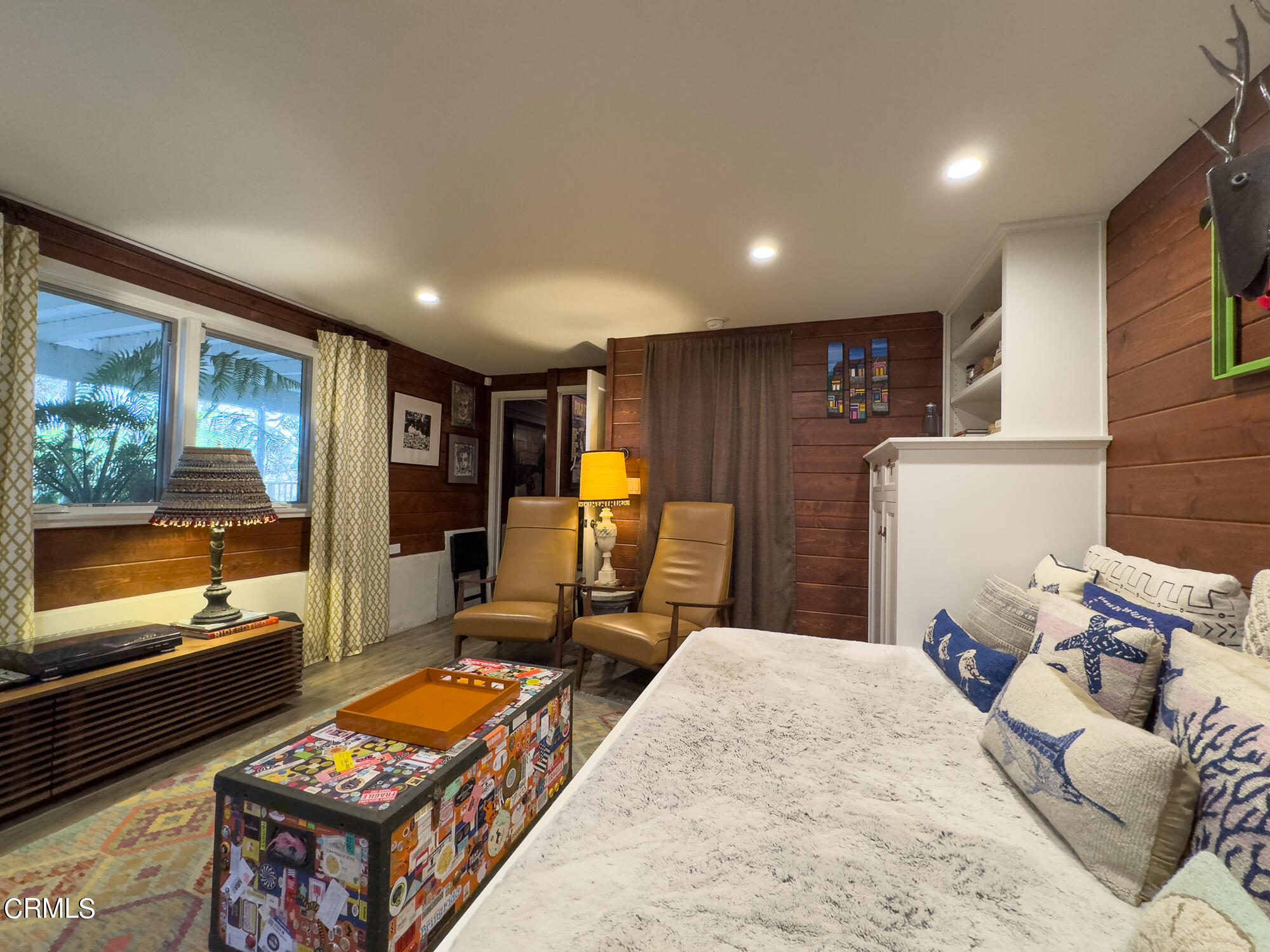 735 Prospect Drive Glendale, CA 91205 - Photo 23 of 49 a bedroom with furniture and a flat screen tv