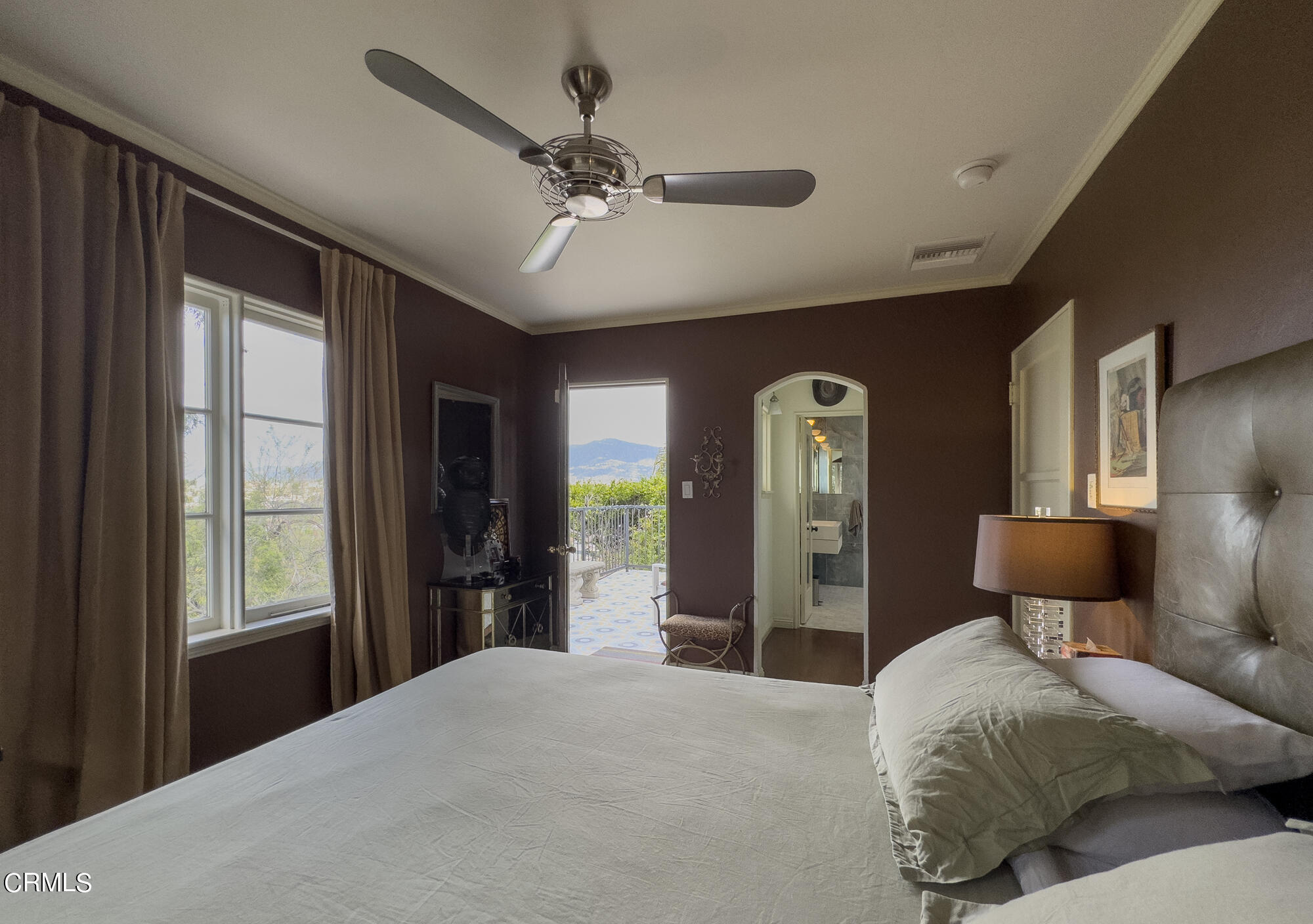 735 Prospect Drive Glendale, CA 91205 - Photo 28 of 49 a bedroom with a bed and a chandelier