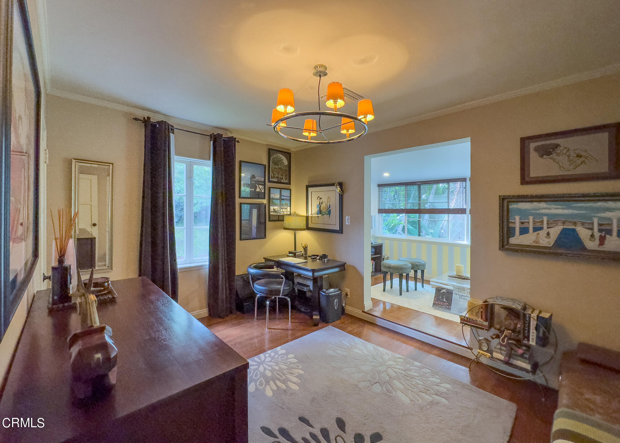 735 Prospect Drive Glendale, CA 91205 - Photo 30 of 49 a view of a dining room with furniture a chandelier and wooden floor