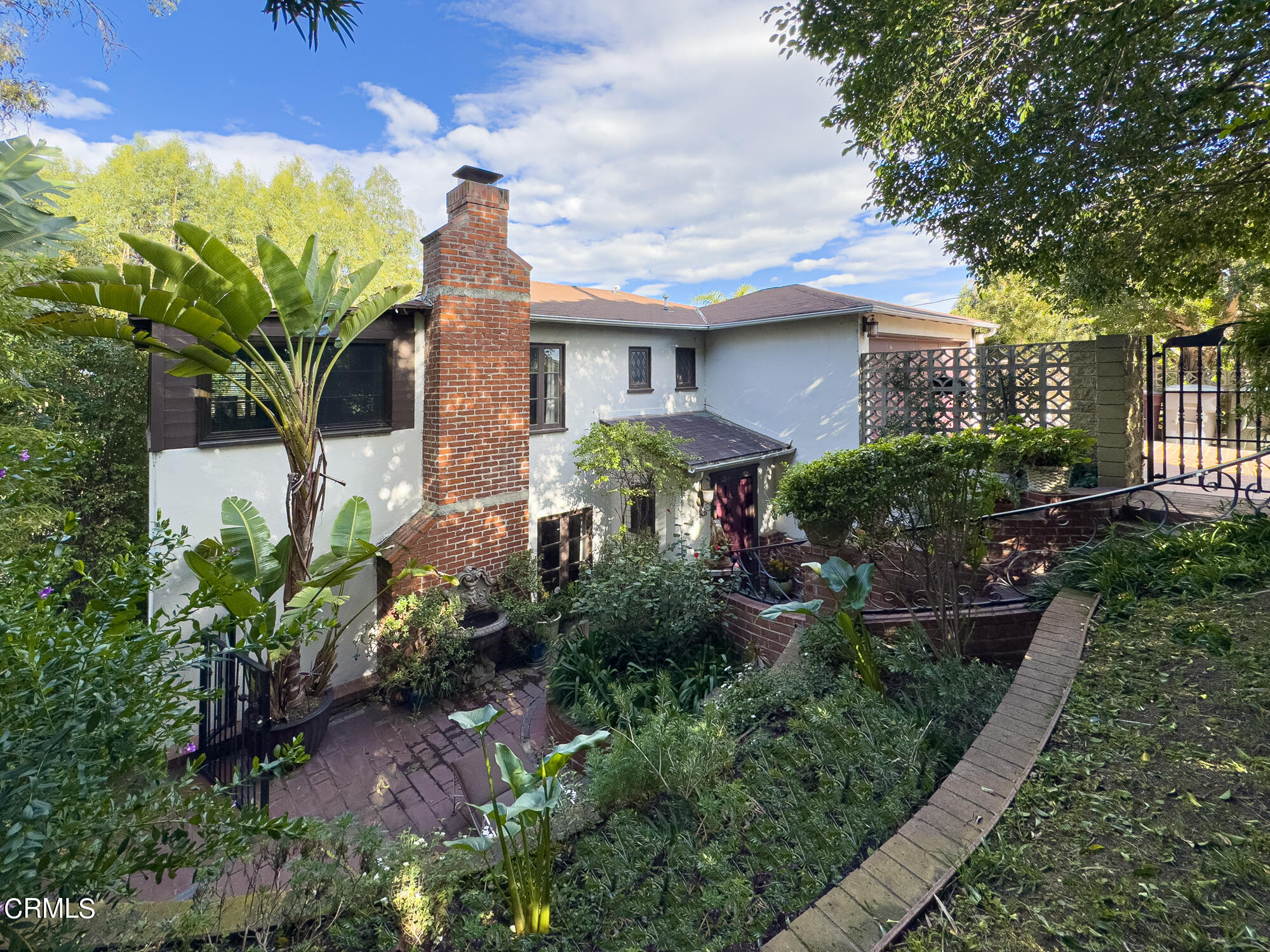 735 Prospect Drive Glendale, CA 91205 - Photo 3 of 49 a front view of a house with a yard