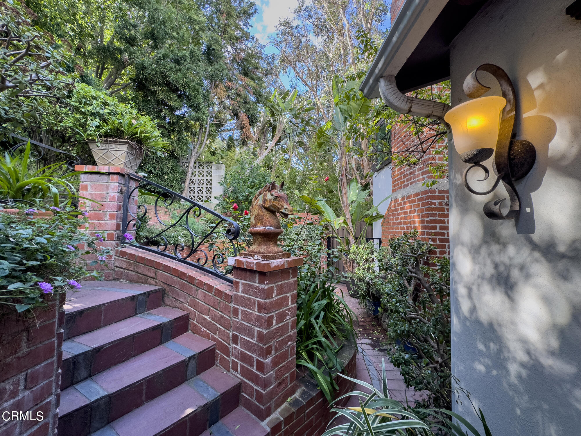 735 Prospect Drive Glendale, CA 91205 - Photo 4 of 49 a view of a swimming pool with a potted plants and a bench