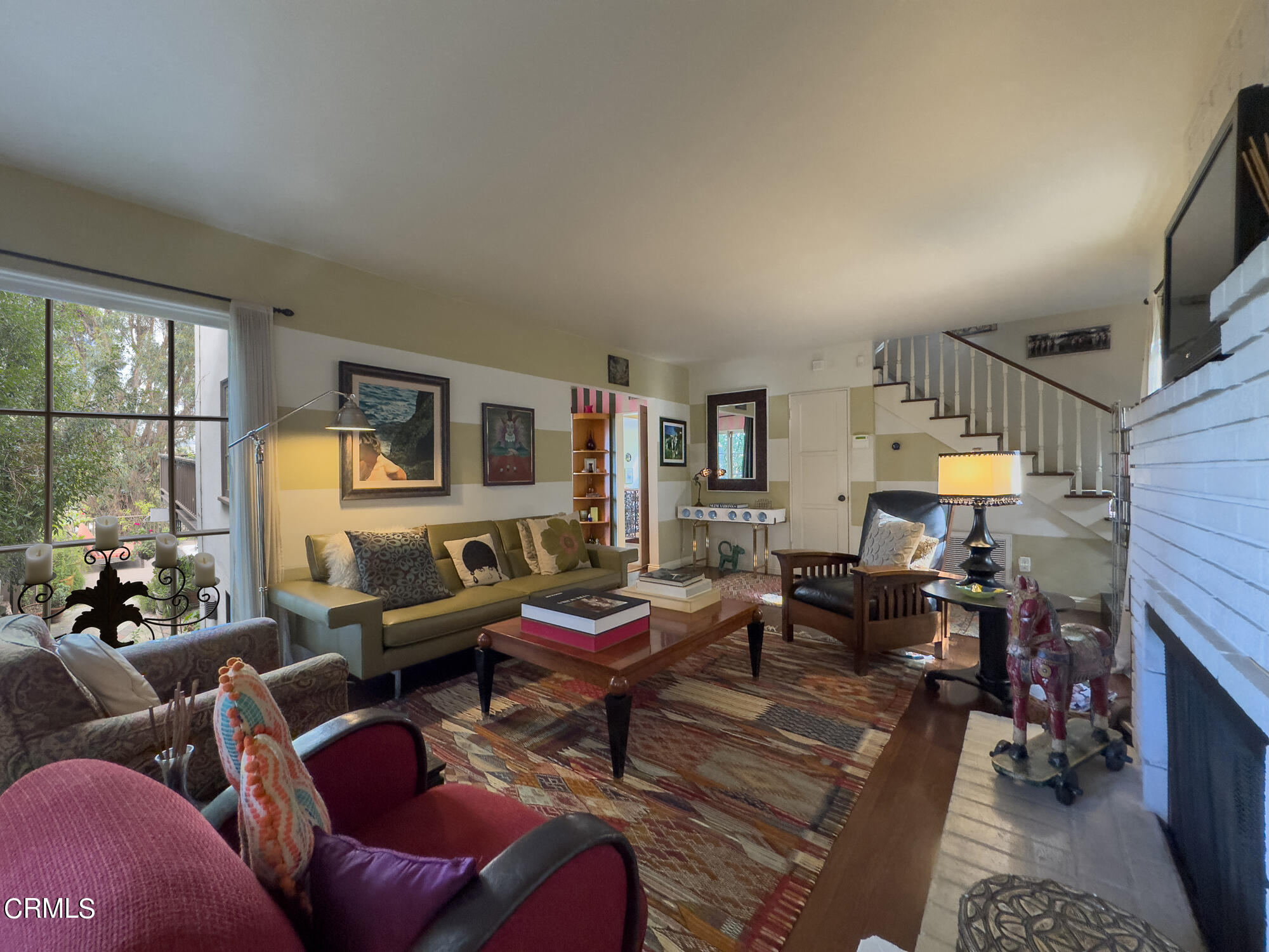 735 Prospect Drive Glendale, CA 91205 - Photo 6 of 49 a living room with furniture a window and a fireplace