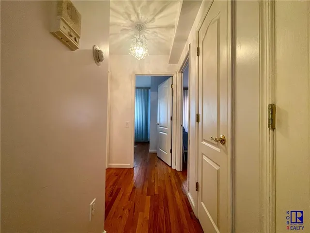 a bedroom with a workspace