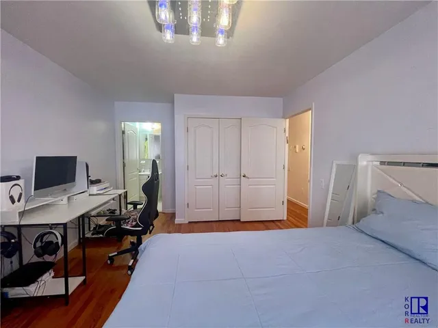 a bathroom with a toilet sink and shower