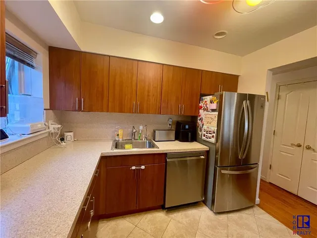 a bathroom with a sink and shower