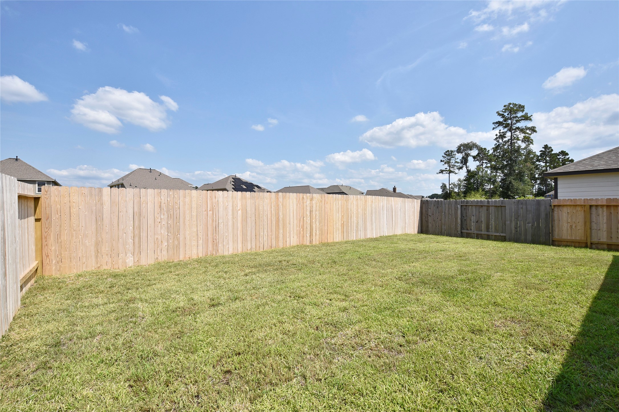 10218 Prairie Dunes Lane Cleveland, TX 77327 - Photo 32 of 32 a view of a backyard