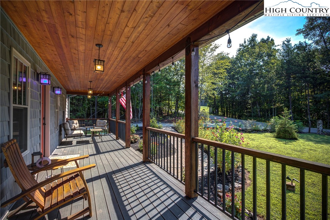 1210 Staghorn Road Purlear, NC 28665 - Photo 12 of 42 a view of porch with seating space