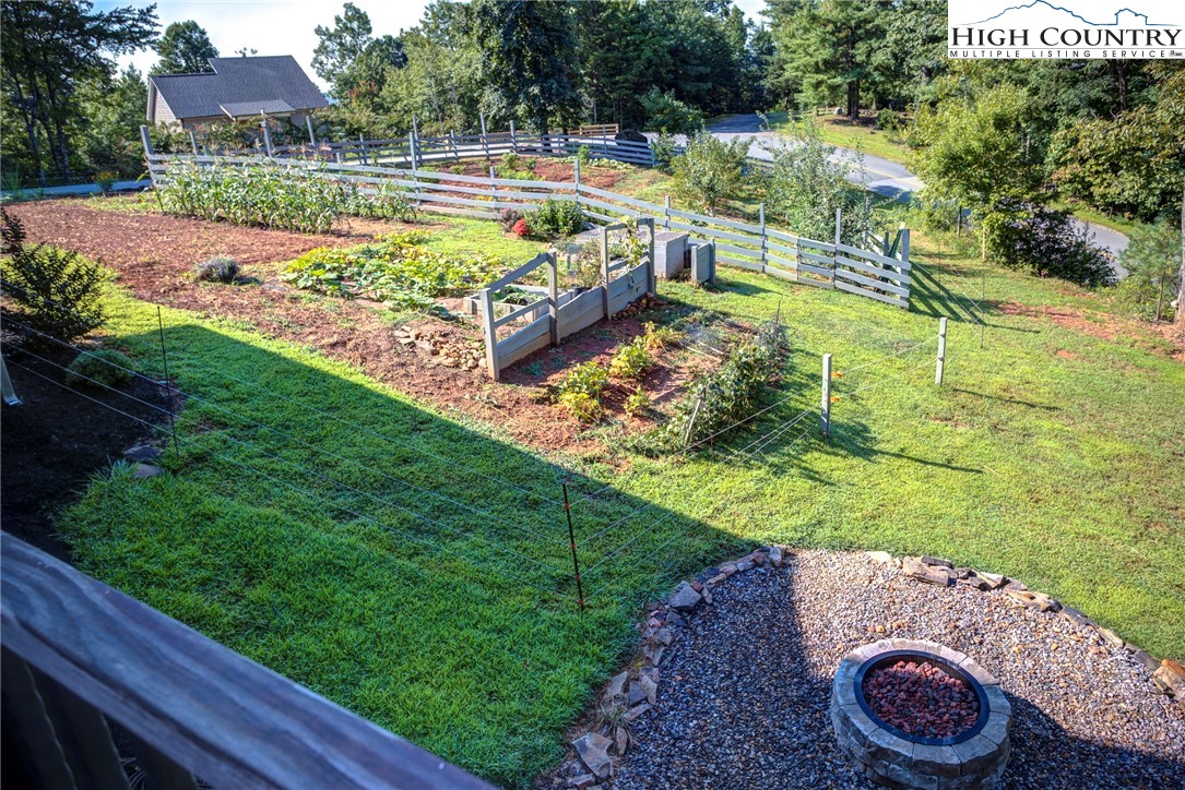 1210 Staghorn Road Purlear, NC 28665 - Photo 38 of 42 a view of a garden with an outdoor space
