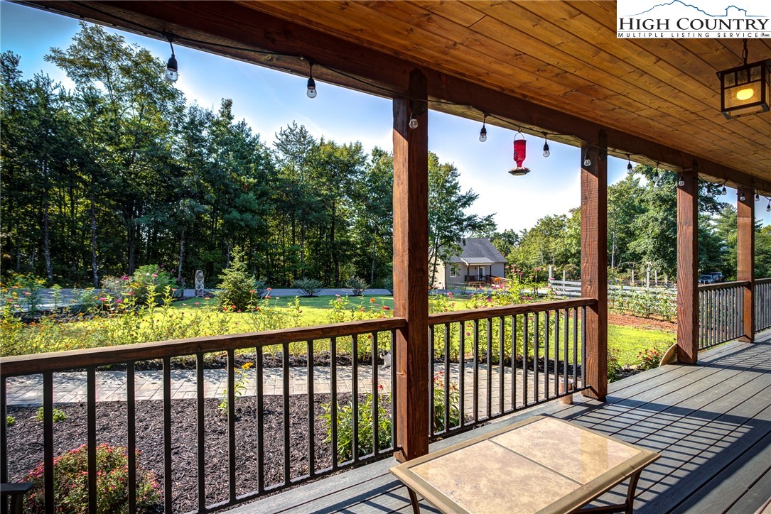 1210 Staghorn Road Purlear, NC 28665 - Photo 8 of 42 a view of a two chairs in the balcony