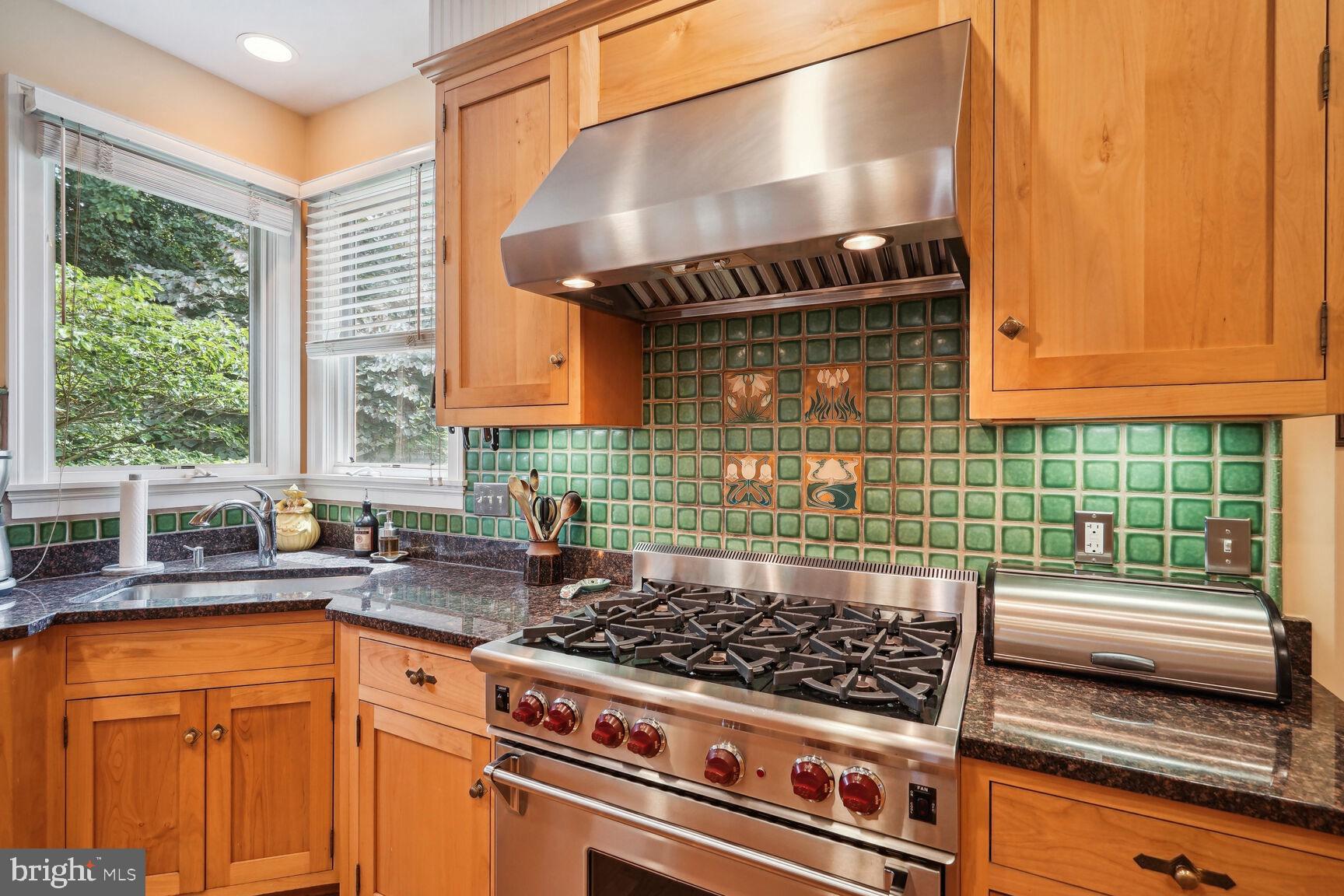 217 Tapawingo Road Southeast Vienna, VA 22180 - Photo 17 of 50 Wolf range with 6 burners