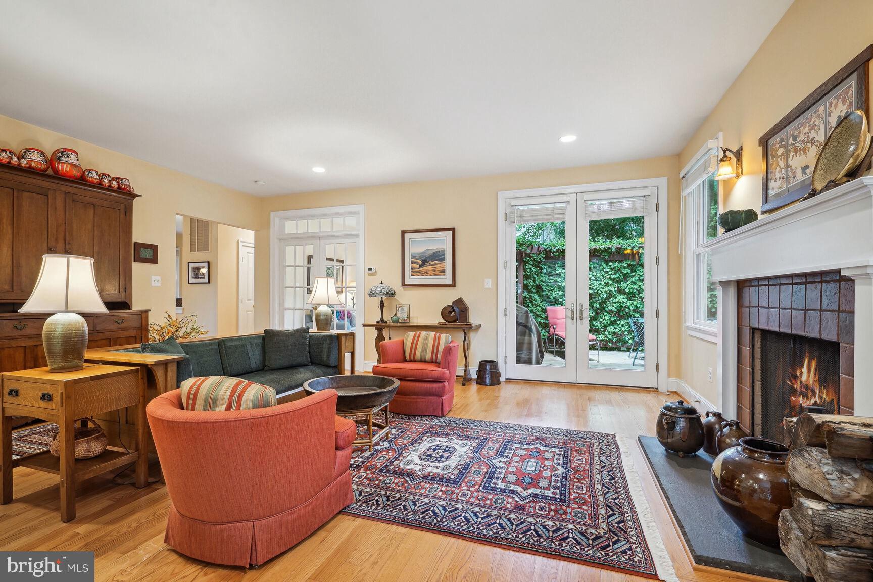 217 Tapawingo Road Southeast Vienna, VA 22180 - Photo 7 of 50 Living room with French doors to deck