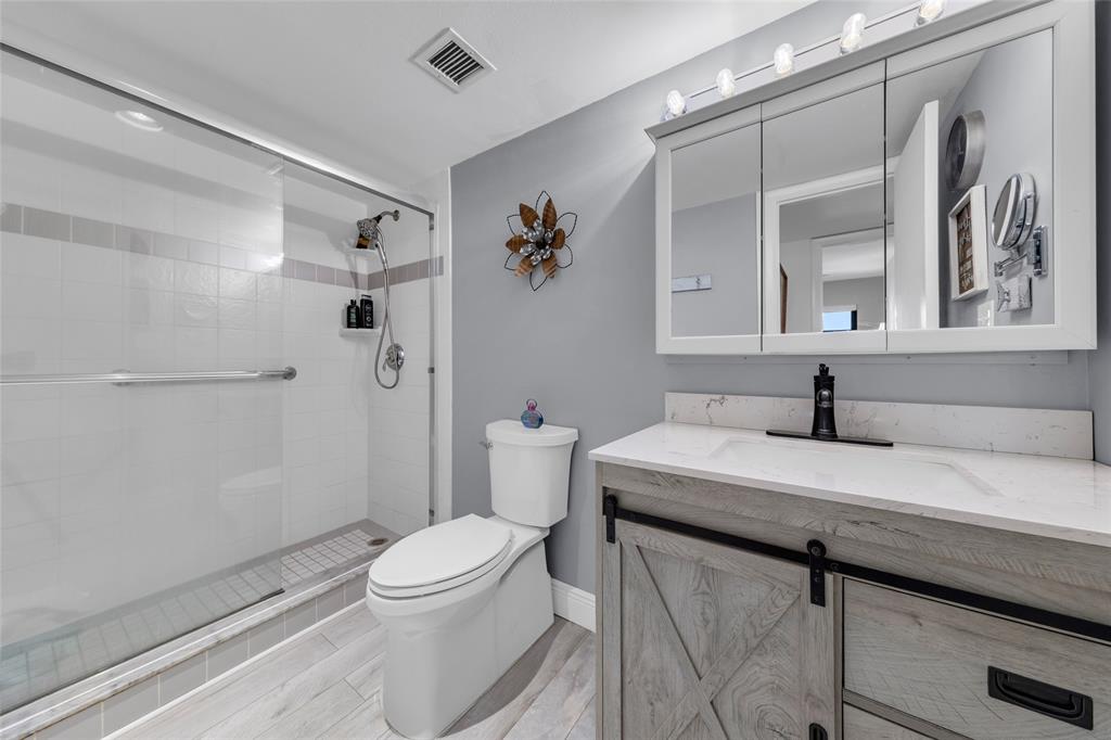 900 River Reach Drive, Unit 518 Fort Lauderdale, FL 33315 - Photo 20 of 47 a bathroom with a sink a toilet and shower