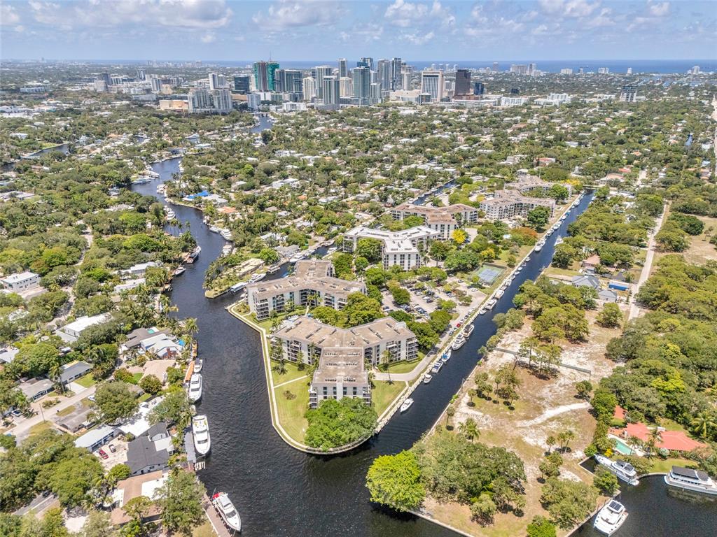 900 River Reach Drive, Unit 518 Fort Lauderdale, FL 33315 - Photo 2 of 47 an aerial view of residential houses with outdoor space and trees