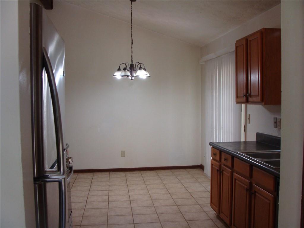 2331 Newgate Drive Decatur, GA 30035 - Photo 10 of 33 a kitchen with stainless steel appliances a refrigerator and a stove top oven