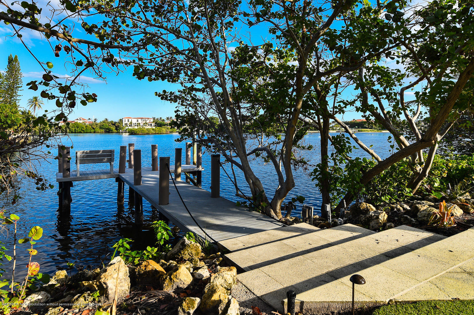 1620 Lands End Road Manalapan, FL 33462 - Photo 16 of 18 a view of a backyard with sitting area