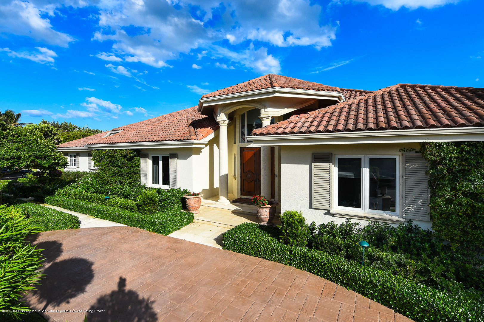 1620 Lands End Road Manalapan, FL 33462 - Photo 17 of 18 a front view of a house with garden