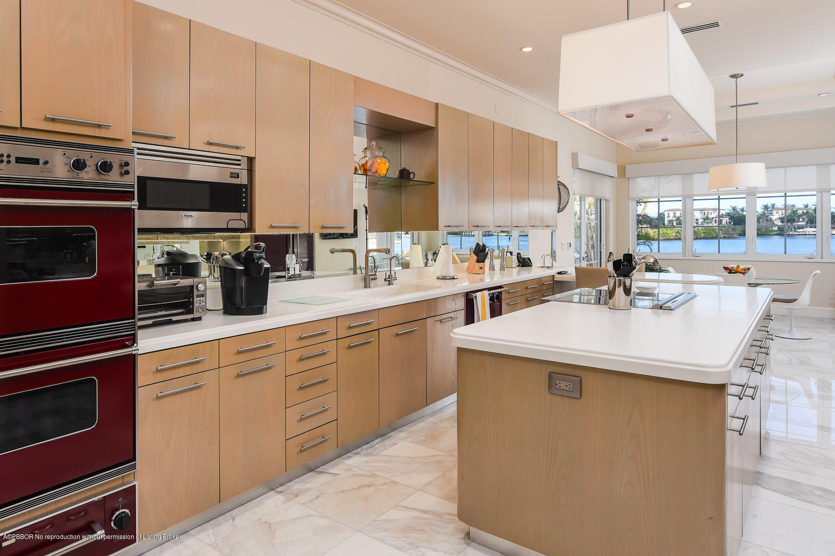 1620 Lands End Road Manalapan, FL 33462 - Photo 6 of 18 a kitchen with stainless steel appliances a sink a stove and a refrigerator