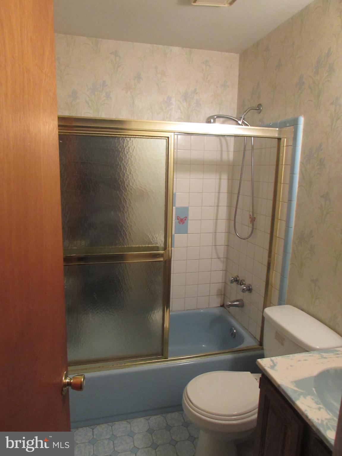 3507 Oaklawn Road Fort Washington, MD 20744 - Photo 15 of 16 a bathroom with a granite countertop toilet and a sink