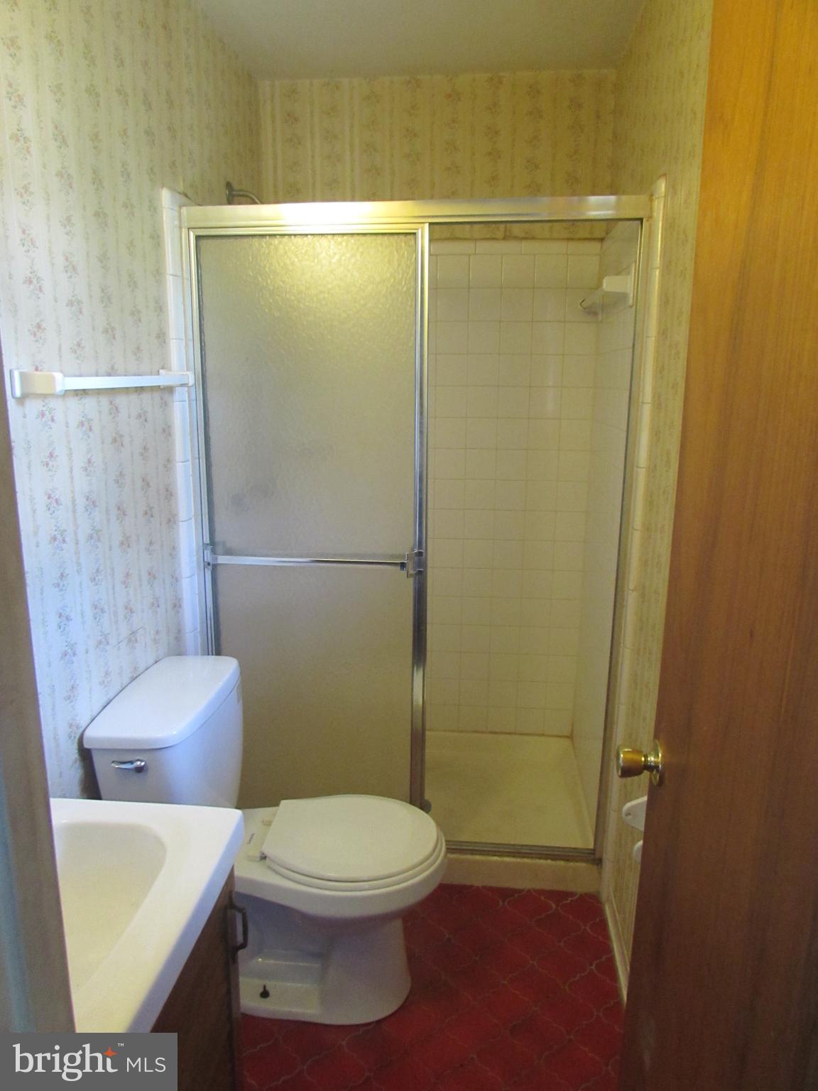 3507 Oaklawn Road Fort Washington, MD 20744 - Photo 16 of 16 a bathroom with a toilet and a shower