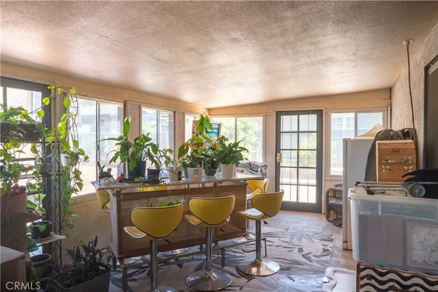 a front view of a house with outdoor space