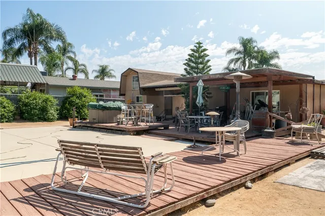 an aerial view of a house with parking