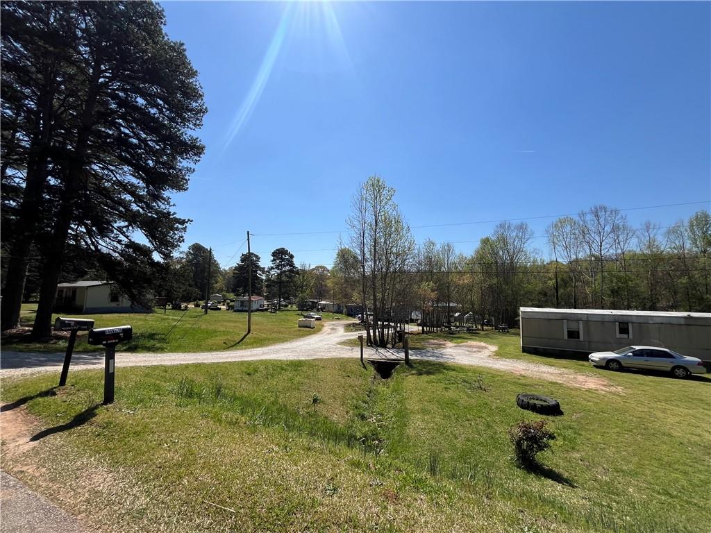 a view of a park with swings and slides