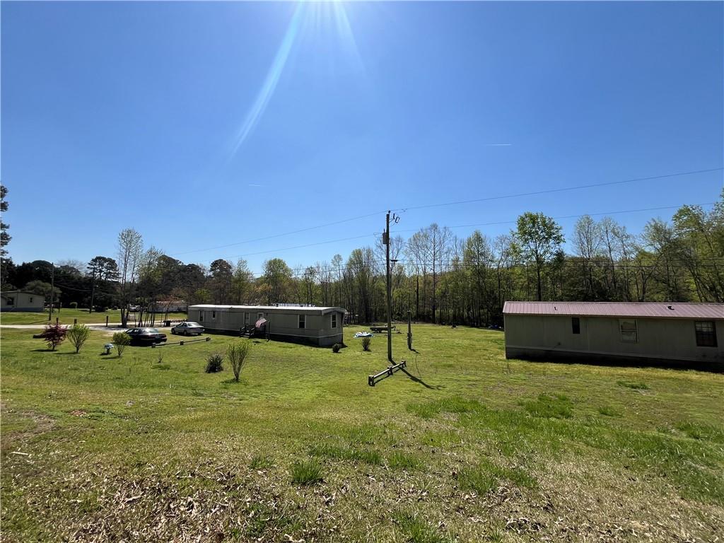 474 Whitney Road Jefferson, GA 30549 - Photo 11 of 55 a view of a lake with outdoor space