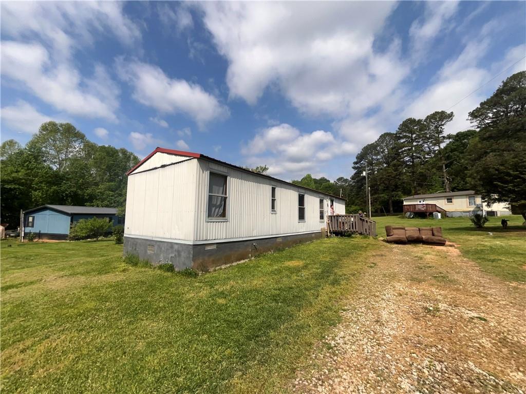 474 Whitney Road Jefferson, GA 30549 - Photo 17 of 55 a view of a house with backyard