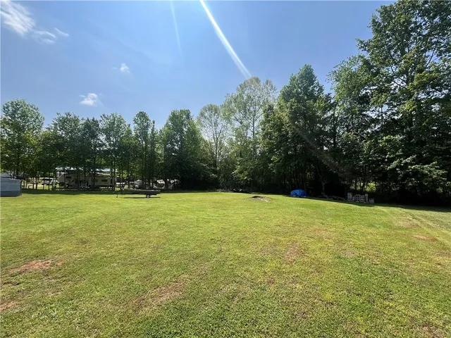 a view of a lake with a big yard