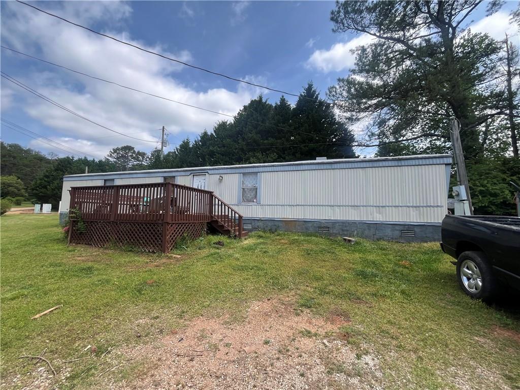 474 Whitney Road Jefferson, GA 30549 - Photo 41 of 55 a view of a house with a yard
