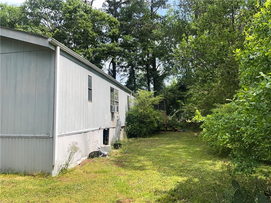 474 Whitney Road Jefferson, GA 30549 - Photo 47 of 55 a view of a backyard of the house