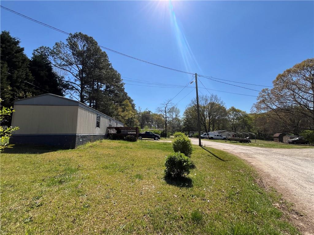 474 Whitney Road Jefferson, GA 30549 - Photo 10 of 55 a view of a house with a yard