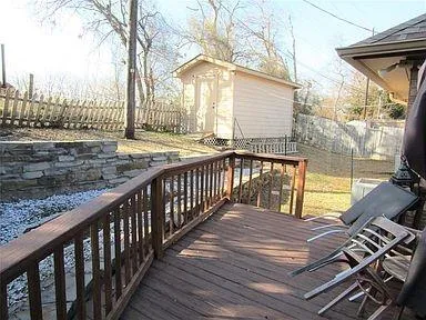 a side view of a house with a yard