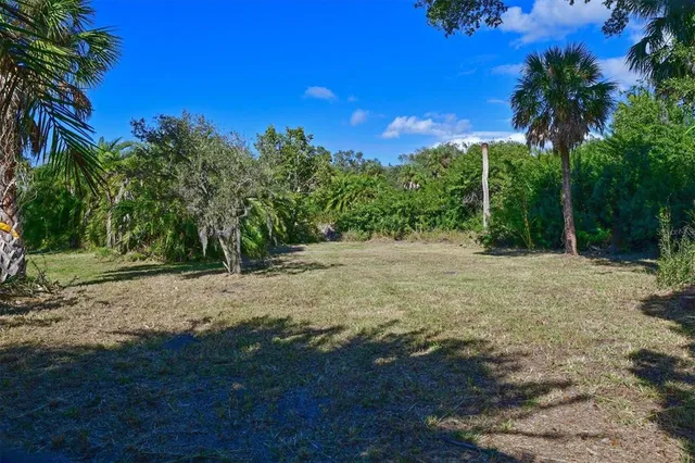 a garden view with a seating space