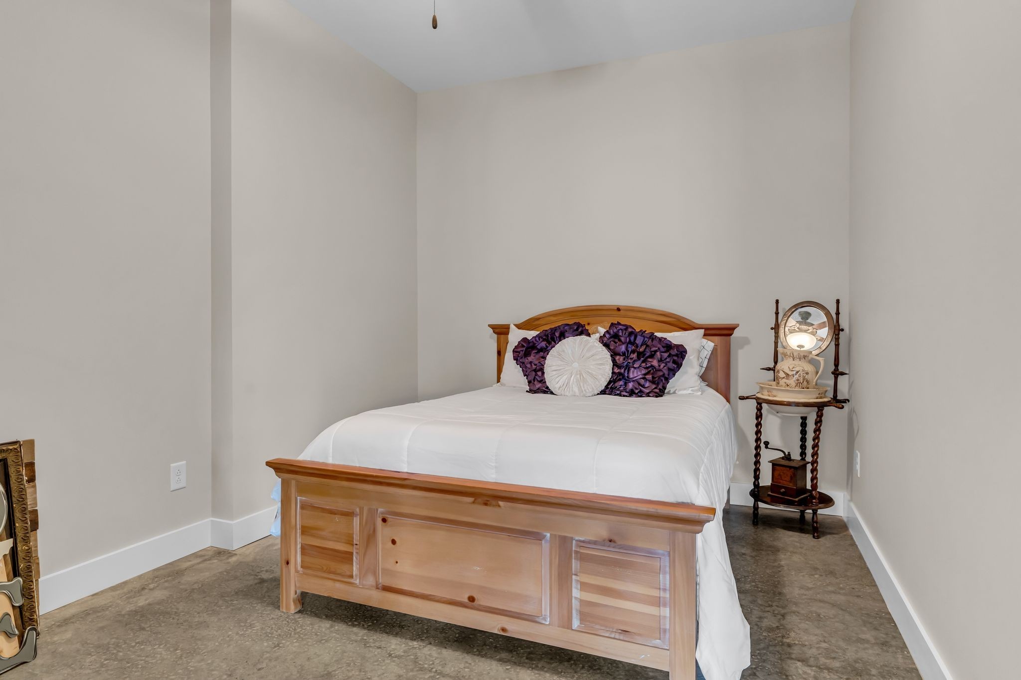 5574 Dowlen Road Cedar Hill, TN 37032 - Photo 41 of 59 a bedroom with a bed and a table