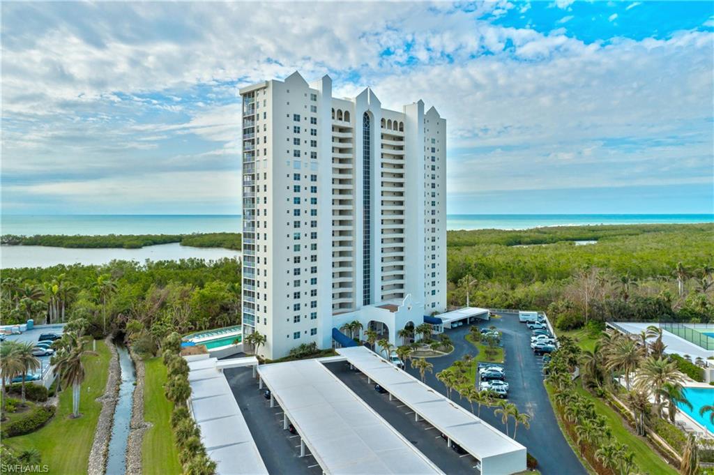 5550 Heron Point Drive, Unit 1804 Naples, FL 34108 - Photo 2 of 20 a view of a city with tall buildings