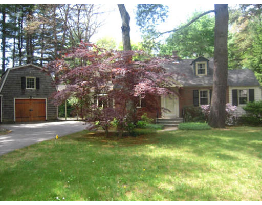 401 Dutton Road Sudbury, MA 01776 - Photo 1 of 1 a front view of a house with a garden