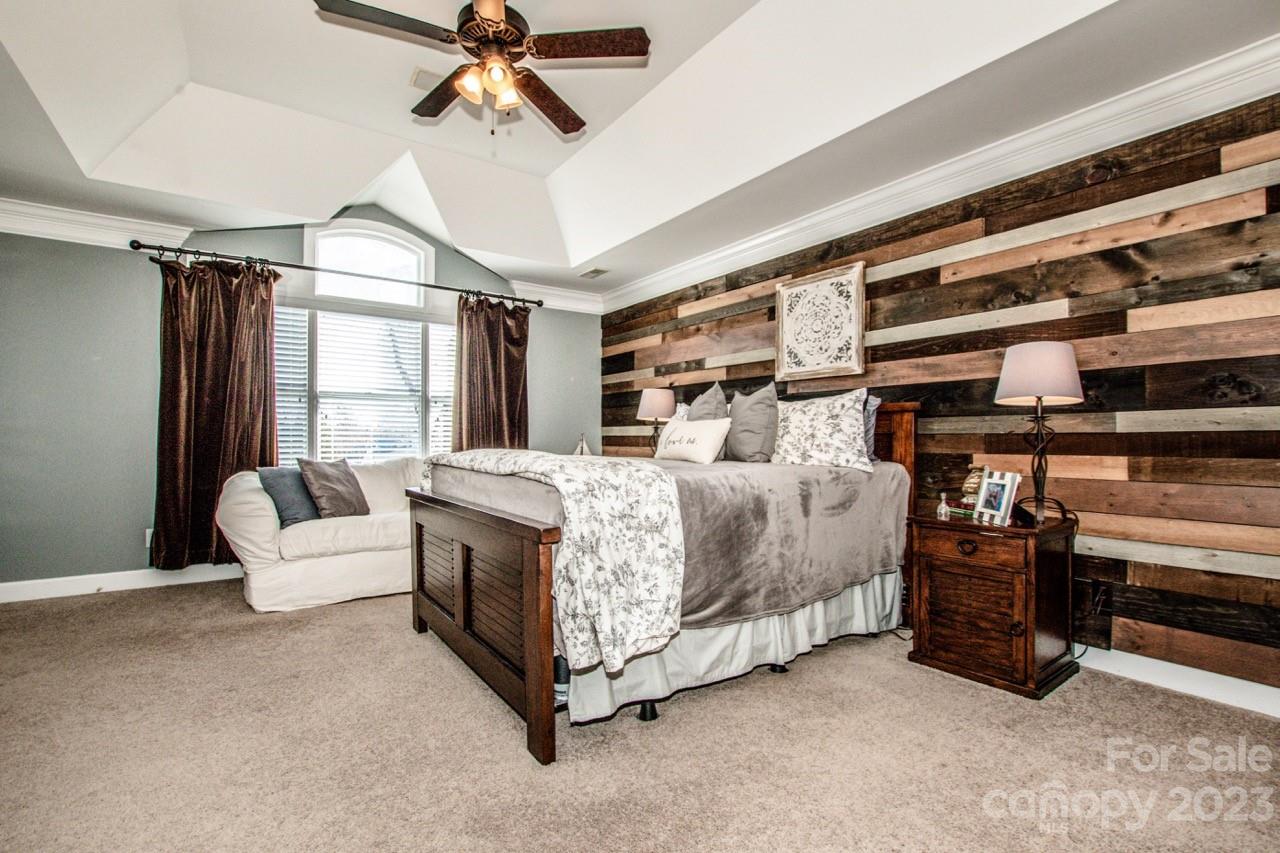 17506 Springwinds Drive Cornelius, NC 28031 - Photo 17 of 35 a bedroom with bed and window