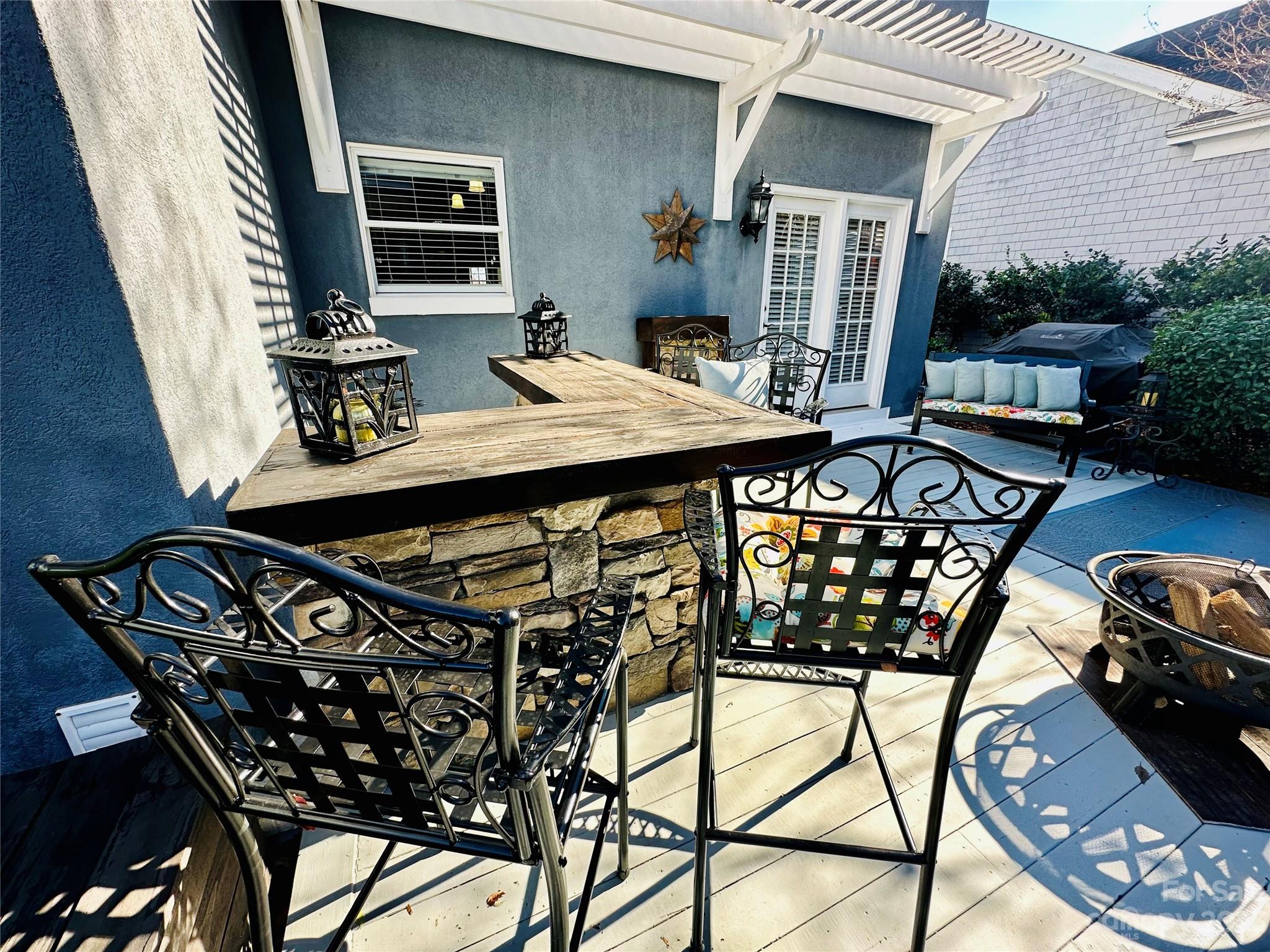 17506 Springwinds Drive Cornelius, NC 28031 - Photo 25 of 35 a view of a chairs and table in the balcony