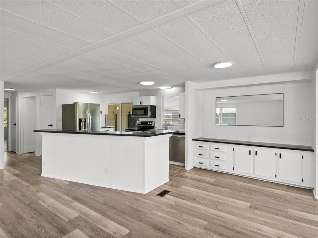 1610 Reynolds Road, Unit 35 Lakeland, FL 33801 - Photo 13 of 59 a view of kitchen with wooden floor