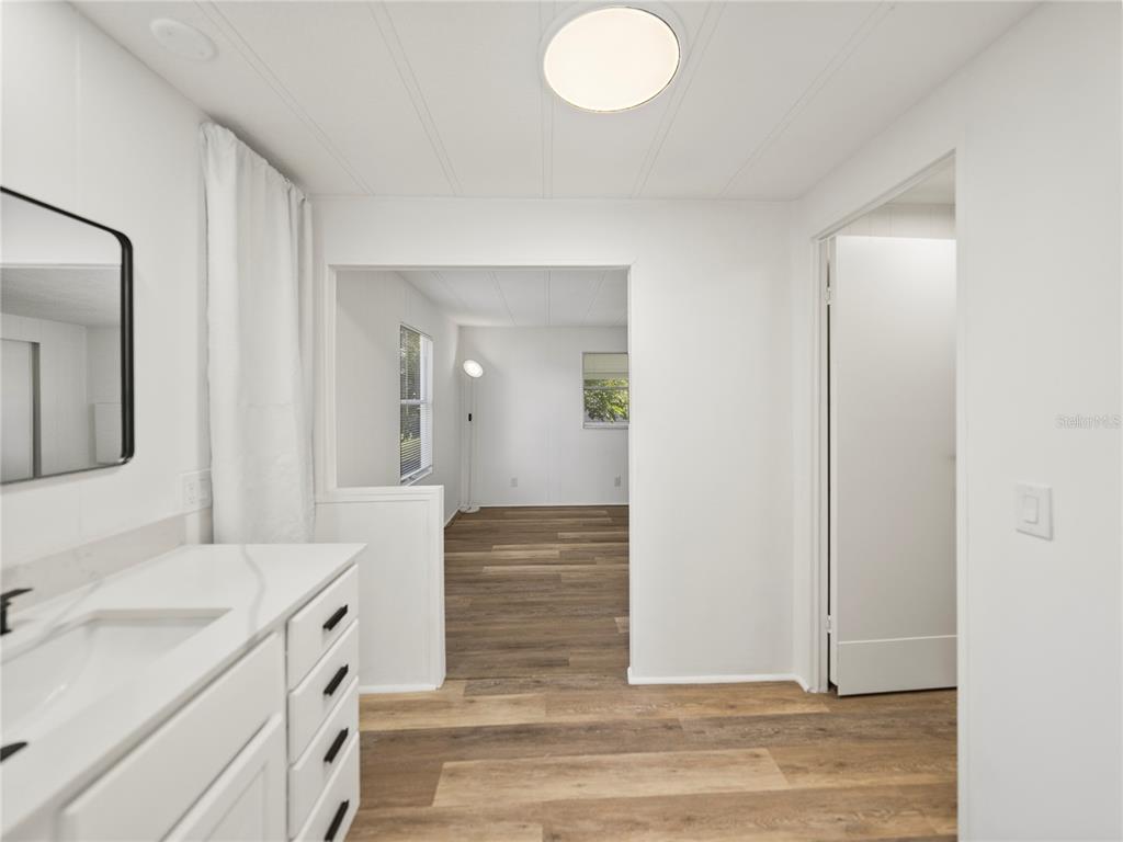 1610 Reynolds Road, Unit 35 Lakeland, FL 33801 - Photo 36 of 59 a bathroom with a sink and a mirror