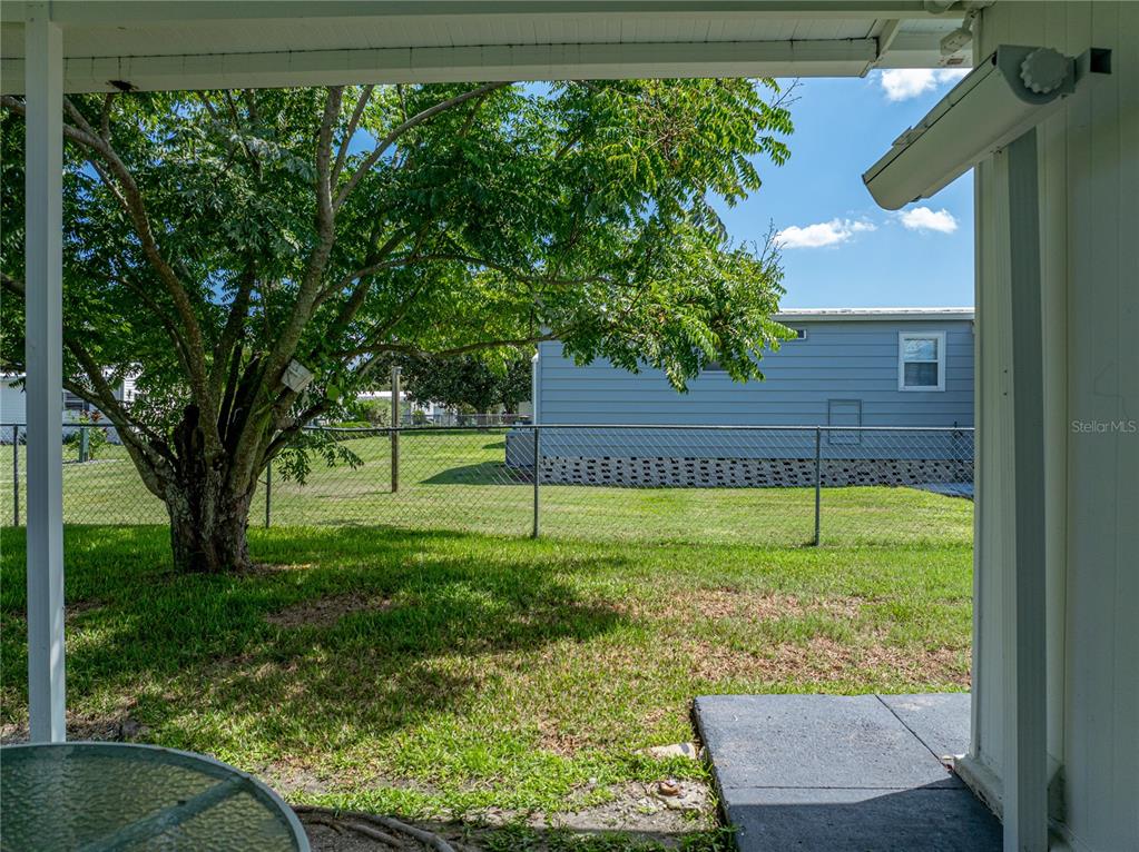 1610 Reynolds Road, Unit 35 Lakeland, FL 33801 - Photo 49 of 59 a view of a yard with a tree
